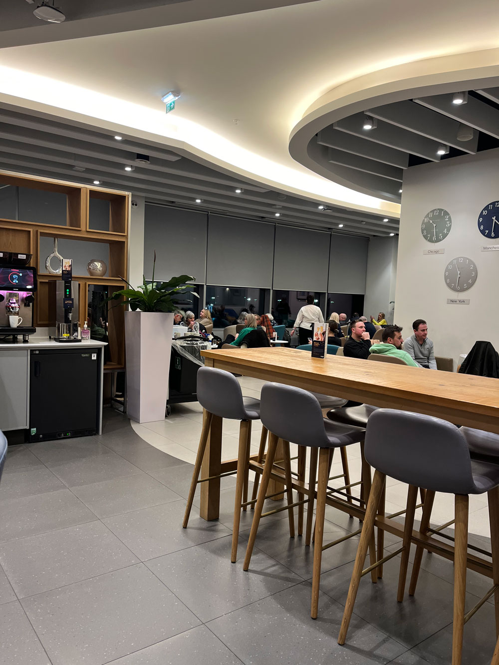 Escape Lounge Terminal 2 Manchester Airport bar area with wines, beers and coffee machine
