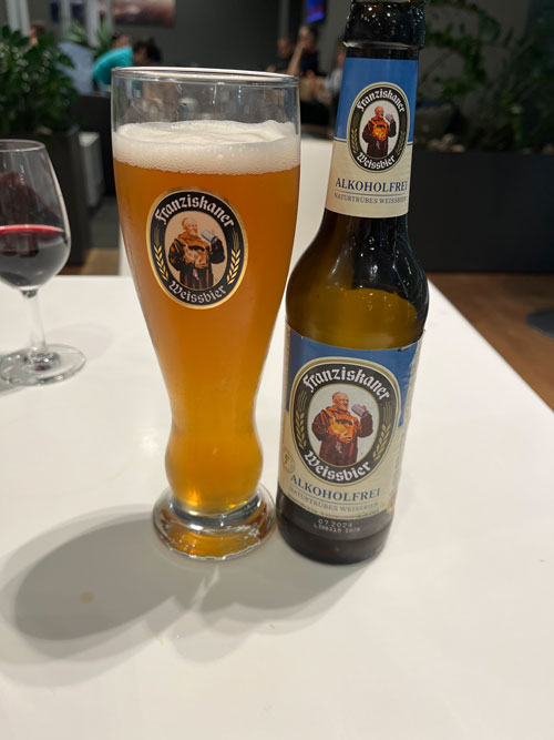 Alcohol free beer bottle and glass in Lufthansa's Business Class lounge in Munich